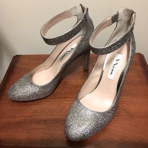 Silver ankle strap back zip pumps